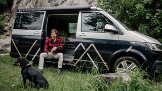 Dog in front of rented camper